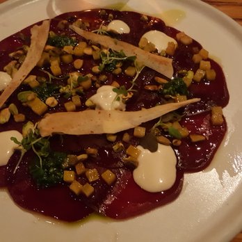 Chambar - Carpaccio de Betteraves Marinated beetroot, miso & tahini, pesto, parsnip chips, roasted pistachios - Belgian Near Me - Vancouver, British Columbia Chambar - Carpaccio de Betteraves Marinated beetroot, miso & tahini, pesto, parsnip chips, roasted pistachios - Belgian Near Me - Vancouver, British Columbia