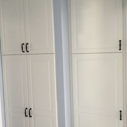 Hallway storage with IKEA cabinets.