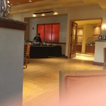 Soleil - a man sitting at a table in a hotel lobby - Tex-Mex Near Me - Glendale, Arizona