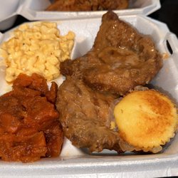 Granny’s Soul Food - Smothered Pork Chop , yams and Mac and cheese