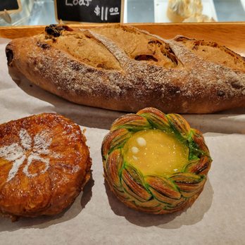 Halekulani Bakery - Yasss please! Mango kouighn amann, Coconut croissant, and fig/nut bread - Bakeries Near Me - Honolulu, Hawaii