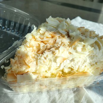 Dahlia Bakery - Triple Coconut Cream Pie slice ($13). It was expensive, but very good. I loved the crust! 3/29/2023 - Bakeries Near Me - Seattle, Washington
