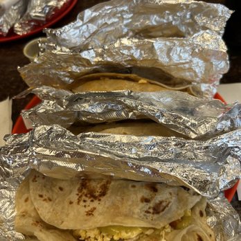 Eddies Tacos - two burritos wrapped in aluminum foil - Tacos Near Me - Pharr, Texas
