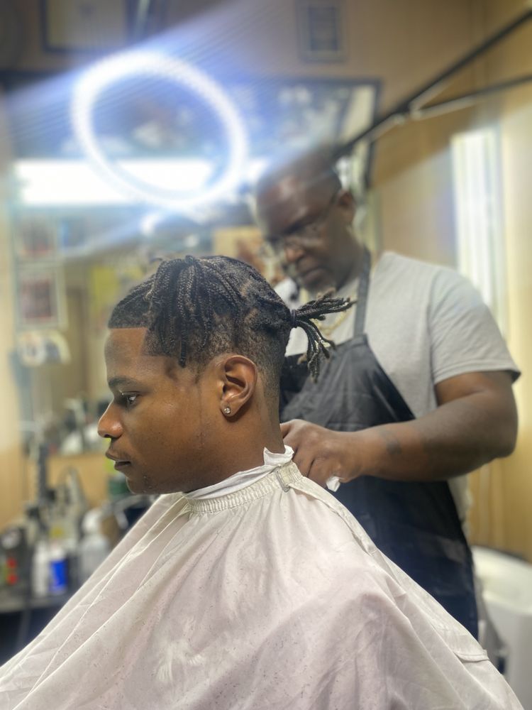 Touch of class elite Barbering Logo