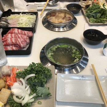 Spring Shabu-Shabu - Dashi and Mala broths with beef belly and other veggies/fish cakes - Hot Pot Near Me - Boston, Massachusetts Spring Shabu-Shabu - Dashi and Mala broths with beef belly and other veggies/fish cakes - Hot Pot Near Me - Boston, Massachusetts
