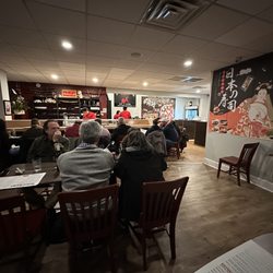 Jerry-San's Sushi Bar - The sushi bar and some tables