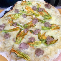 Squash blossoms with sausage. Delish. Squash blossoms with sausage. Delish.