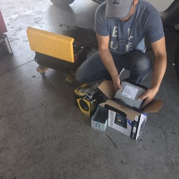 Audio Planet - Kevin taking my new Kenwood stereo out of the factory box. - Car Stereo Installation Near Me - Van Nuys, California Audio Planet - Kevin taking my new Kenwood stereo out of the factory box. - Car Stereo Installation Near Me - Van Nuys, California