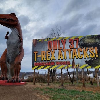 Dinosaur World - Giant dino and billboard near highway - Museums Near Me - Cave City, Kentucky