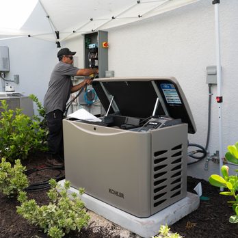 Air & Energy - Electrician installing a Kohler Whole-Home Generator - Plumbing Near Me - Bradenton, Florida