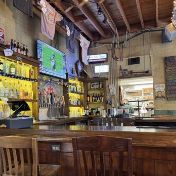 Universal Joint - The bar area, demonstrative of the decor. - Burgers Near Me - Clayton, Georgia
