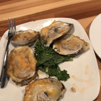Salt Rock Tavern - Grilled Oysters during Happy Hour! Yummy every time! - New American Near Me - Oldsmar, Florida Salt Rock Tavern - Grilled Oysters during Happy Hour! Yummy every time! - New American Near Me - Oldsmar, Florida