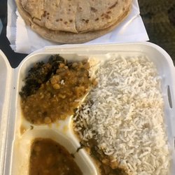 It's the rice, roti (tortilla), and 2 veggie dish for $7.99