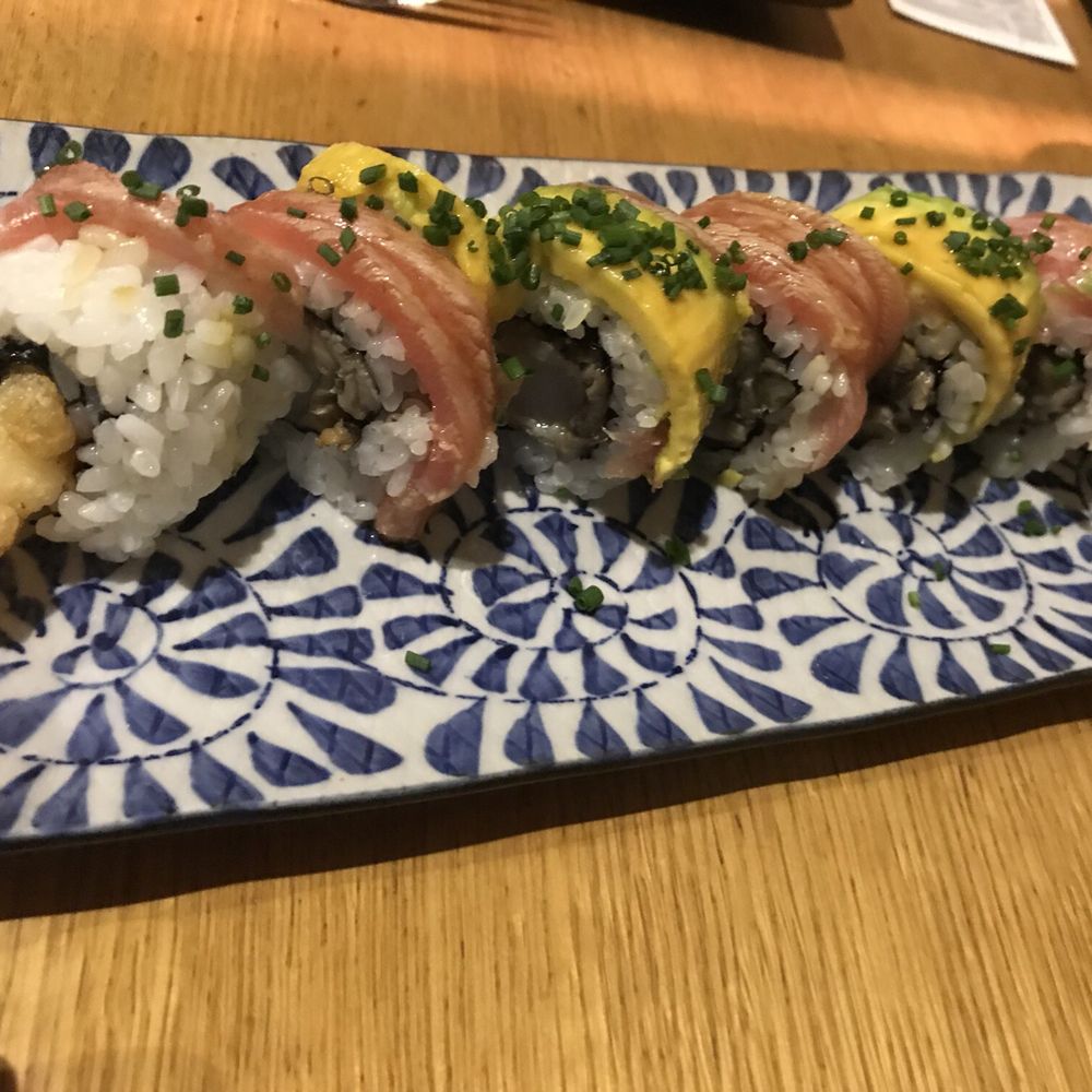 Scallop, Shrimp wraped with rice seawed, salmon and avocado Scallop, Shrimp wraped with rice seawed, salmon and avocado