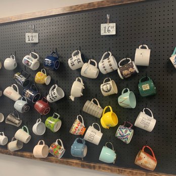 River Road Coffee and Popsicles - Adorable wall of mugs ! - Coffee & Tea Near Me - Cocoa, Florida