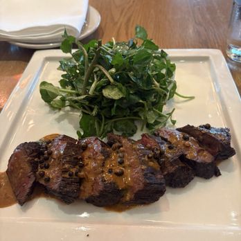 Central Michel Richard - Hanger steak with peppercorn sauce, watercress salad with Dijon vinaigrette (usually comes with fries, but I substituted broccolini) - New American Near Me - Washington, DC, District of Columbia