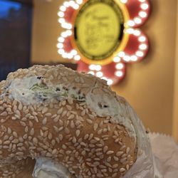 Moe's Broadway Bagel - Sesame bagel with scallion cream cheese