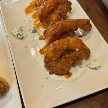 Redstone American Grill - Buffalo Jumbo Shrimp ($19) Buffalo Sauce, Blue Cheese Dressing - Seafood Near Me - Dresher, Pennsylvania Redstone American Grill - Buffalo Jumbo Shrimp ($19) Buffalo Sauce, Blue Cheese Dressing - Seafood Near Me - Dresher, Pennsylvania