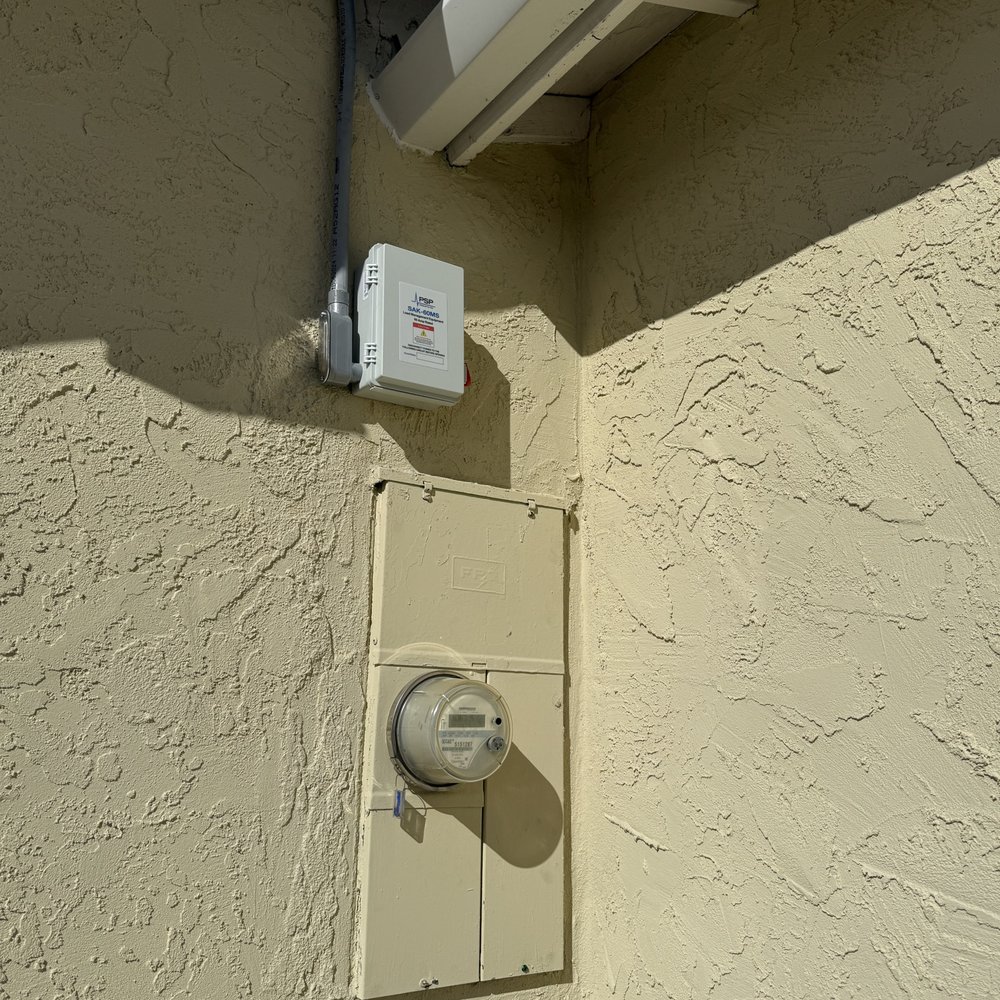 Car Charger Guy - Load Management device at breaker panel on the side wall. - Electricians Near Me - Oceanside, California Car Charger Guy - Load Management device at breaker panel on the side wall. - Electricians Near Me - Oceanside, California