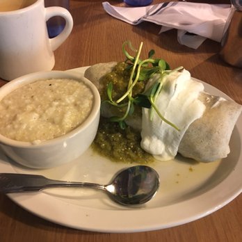 Ria's Bluebird - Bluebird burrito with a side of grits and cup of coffee. - Southern Near Me - Atlanta, Georgia Ria's Bluebird - Bluebird burrito with a side of grits and cup of coffee. - Southern Near Me - Atlanta, Georgia
