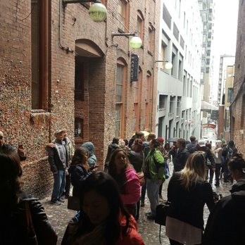 The Gum Wall - The alleyway - cars can drive down here =P - Local Flavor Near Me - Seattle, Washington The Gum Wall - The alleyway - cars can drive down here =P - Local Flavor Near Me - Seattle, Washington