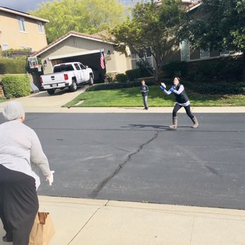 Nibblers Popcorn - Tossing Nibblers popcorn to neighbors during the Covid-19 stay at home order. This made our driveway happy hour! - Popcorn Shops Near Me - El Dorado Hills, California
