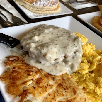 Franco's Flapjack Family Restaurant - Country Fried Steak with scrambled eggs and hash browns. My small stack of pancakes lurking behind. - Breakfast & Brunch Near Me - Poway, California Franco's Flapjack Family Restaurant - Country Fried Steak with scrambled eggs and hash browns. My small stack of pancakes lurking behind. - Breakfast & Brunch Near Me - Poway, California