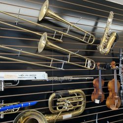 Oasis Pawn - We have wind instruments, , violins, and more to choose from.