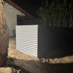 Henley Custom Fencing - Corrugated metal fence for propane tank surround
