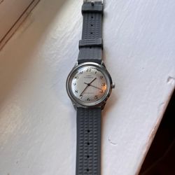 Time Centre - New crystal on old Timex.