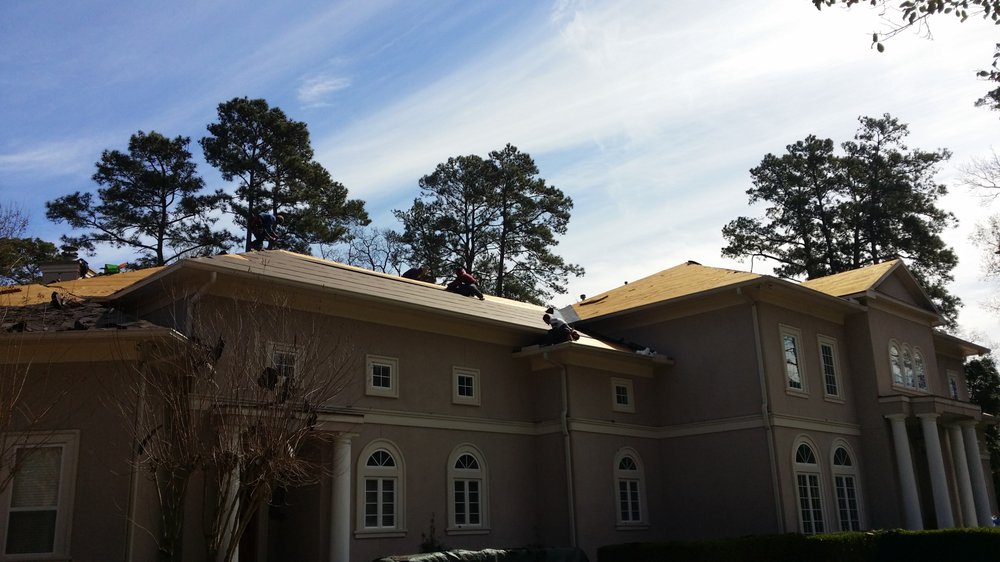 Slide of Redemption Roofing and General Contracting