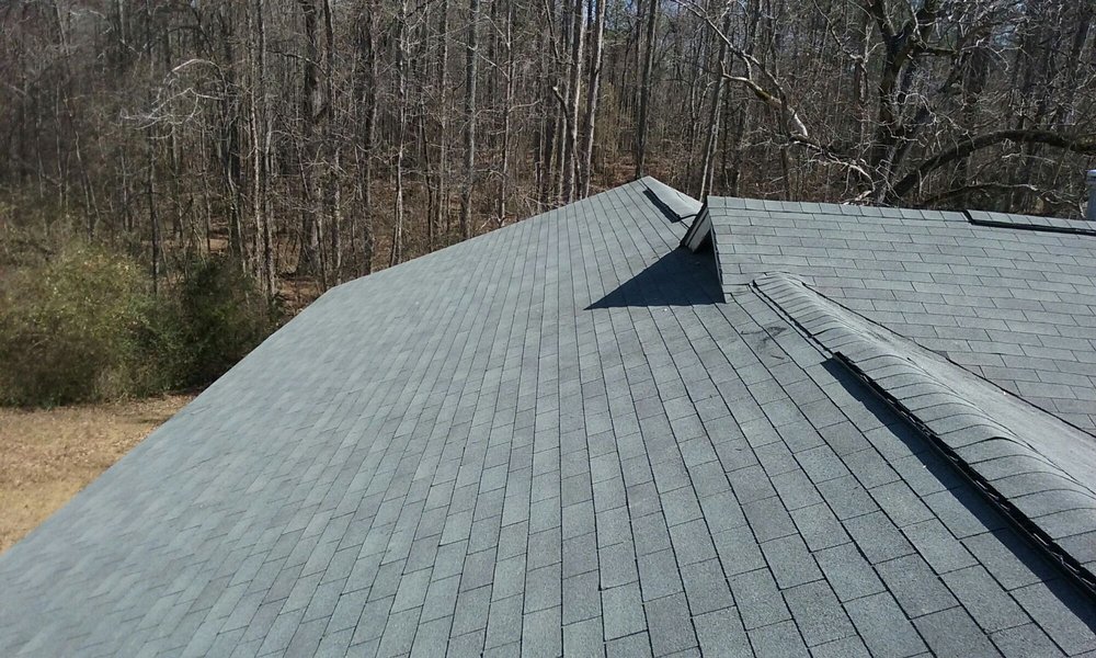 Slide of Tim's Roofing