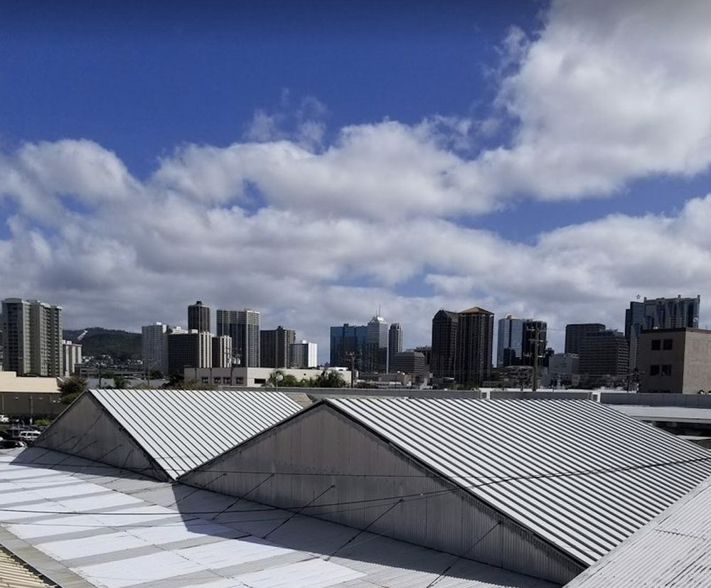 Slide of Action Roofing Hawaii