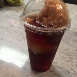 Sweet tea float with peach sorbet ! Sweet tea float with peach sorbet !