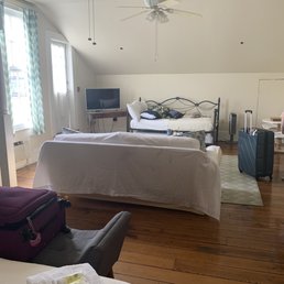 From bed to "living room" showing couch and daybed with trundle. Private entrance to courtyard and balcony on left From bed to "living room" showing couch and daybed with trundle. Private entrance to courtyard and balcony on left