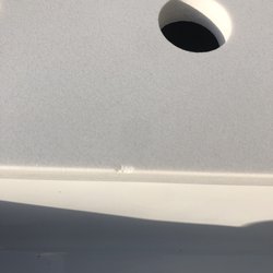 Lowe's Home Improvement - Chip around the ridge of the front of the sink