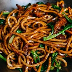 Dumpling Baby China Bistro - Chubby Shanghai - Thick Shanghai-style noodles stir-fried in dark soy, with spinach and light garlic. Protein add-ons available.