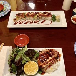 Super Dragon roll and teriyaki chicken with hot sake. Super Dragon roll and teriyaki chicken with hot sake.
