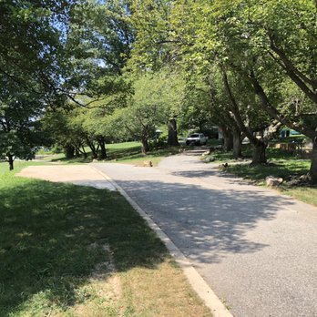 Lafayette-Pointer Recreation Center - Walkway to center of park, dcdpr vehicle idling in background, restrooms and tennis to the right - Recreation Centers Near Me - Washington, DC, District of Columbia