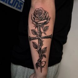 Lions Den Tattoo Studio - Rose tattoo from Steve