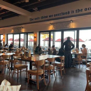 Crabby's Oceanside - Dining area looking out into the deck - Seafood Near Me - Daytona Beach, Florida