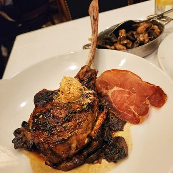 The Capital Grille - The bone-in  Tomahawk Veal chop looking amazing and a bit pre-historic! - Steakhouses Near Me - Naples, Florida