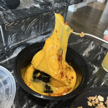 LoCo Burrito - "Queso" that was supposed to come with all the fixings. Nuked it for 60 second on high and it wouldn't melt. - Mexican Near Me - Longmont, Colorado