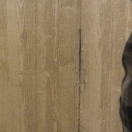 Front desk area/peeling wallpaper