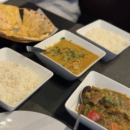 Rice, Cheese Naan, Lamb Korma, spicy Spice Grill Special Chicken Curry. Rice, Cheese Naan, Lamb Korma, spicy Spice Grill Special Chicken Curry.