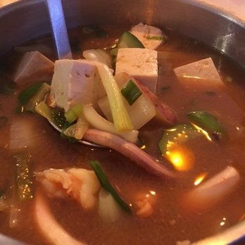 The Third Place - A dinner bowl serving of seafood soybean soup. Think dark roasted miso soup. - Korean Near Me - Redmond, Washington The Third Place - A dinner bowl serving of seafood soybean soup. Think dark roasted miso soup. - Korean Near Me - Redmond, Washington