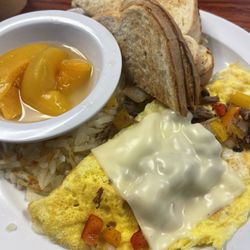 Fairmont Diner - The Philly Omelette with hash browns, side of toast and fruit.