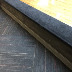 Skateland - Clean, newer carpet and carpeted bench surrounding most of the rink