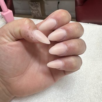 Susan's Nails - Sarah fixing the shape - Nail Salons Near Me - Redwood City, California Susan's Nails - Sarah fixing the shape - Nail Salons Near Me - Redwood City, California