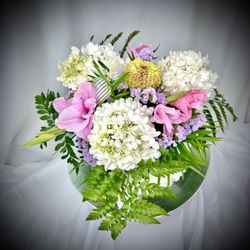 CPK Floral Designs - Fluffy white Hydrangeas, pink Gladiolas, snd lime Zinnia create a beautiful floral collage.